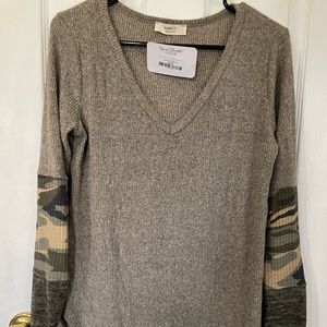 V-neck, Long sleeve tee. Camouflage sleeves.